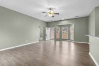 The family room serves as a warm and inviting gathering space, highlighted by luxury vinyl
flooring and a charming bay-window nook—ideal for additional seating or an intimate dining
area.