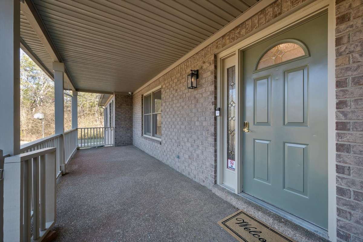 welcome home to your oversized covered front porch overlooking oversized front yard a Brin your rocking chairs !!!