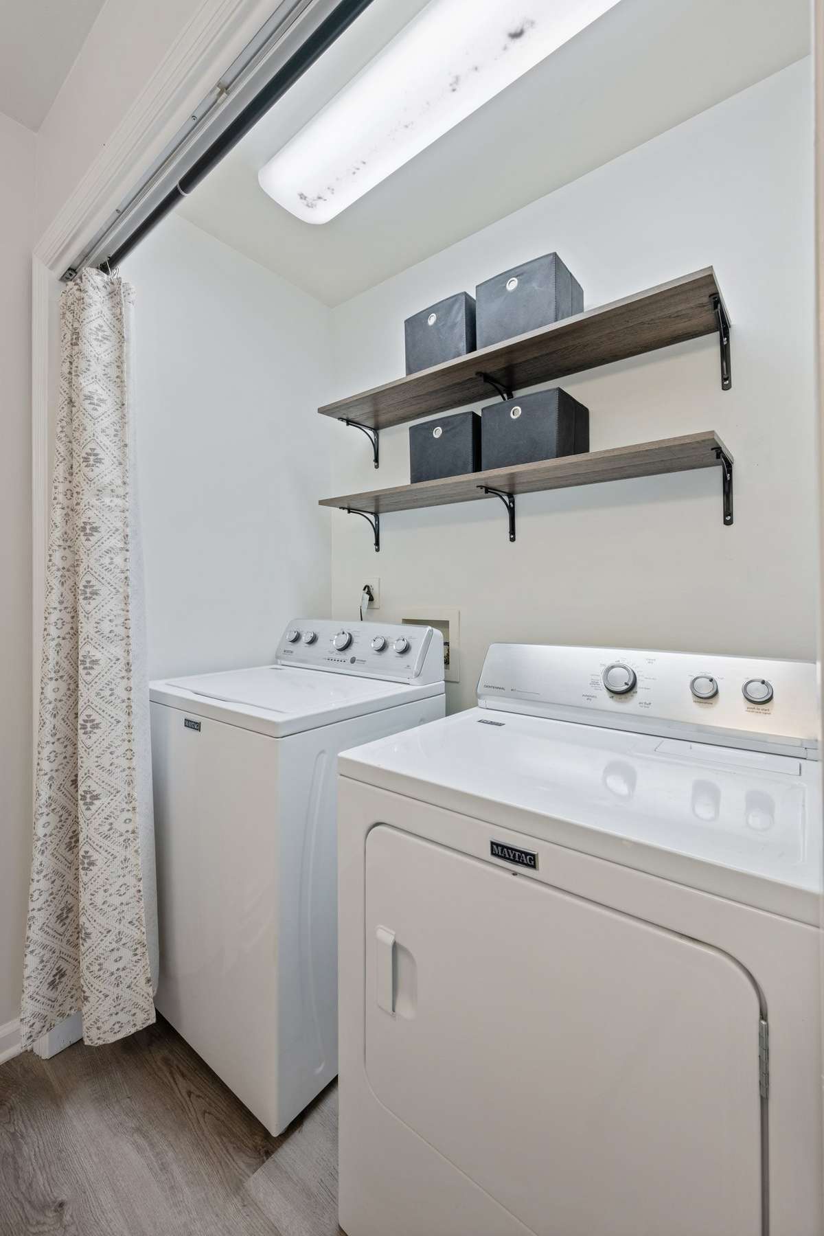 laundry area off kitchen newer washe /dryer to remain with home