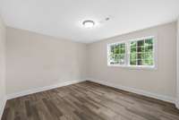 Spacious second bedroom with large closet.