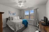 This Upstairs Bedroom has Plenty of Room for a "Work from Home Office" as Well.