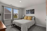 This Additional Upstairs Bedroom has a Extra Large Walk-In Closet.