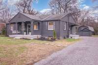 The long gravel driveway leads to the detached 2 car garage with finished studio space offering excellent flexibility for guests, or a private workspace