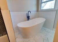 Large soaking tub in guest bath