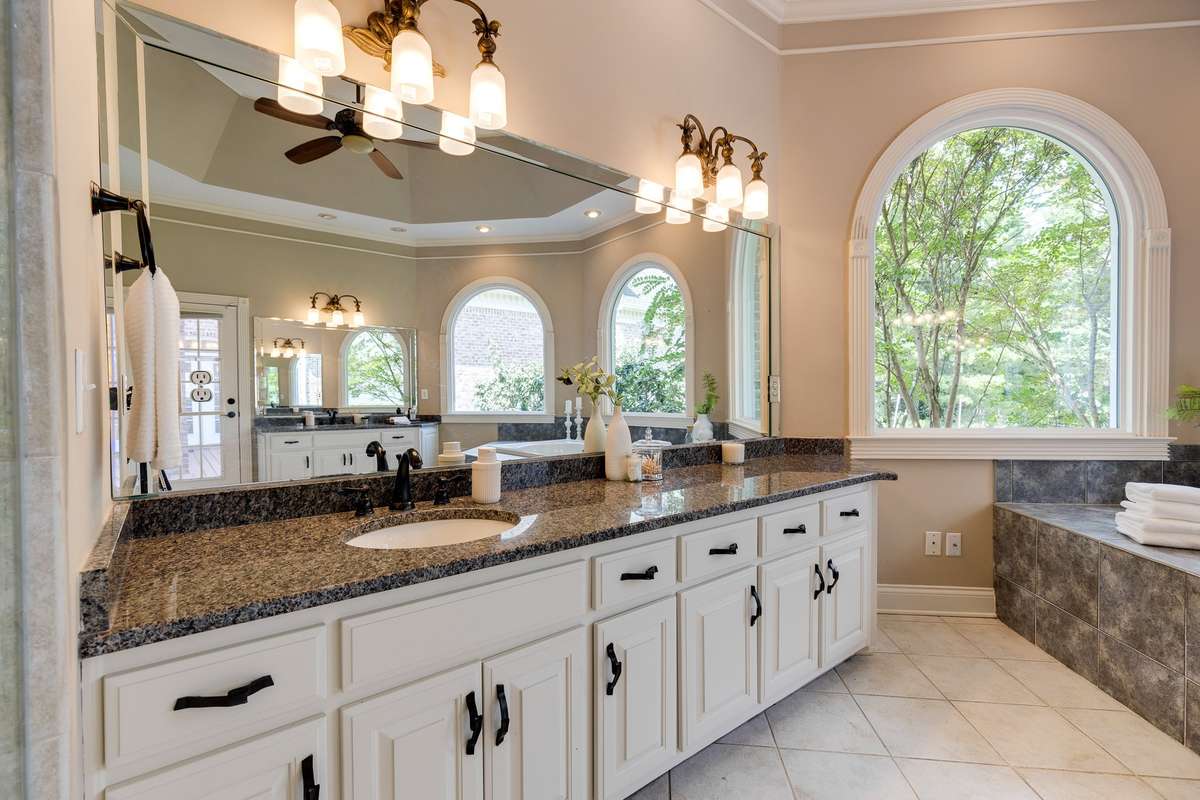 granite counters and new vanity lights