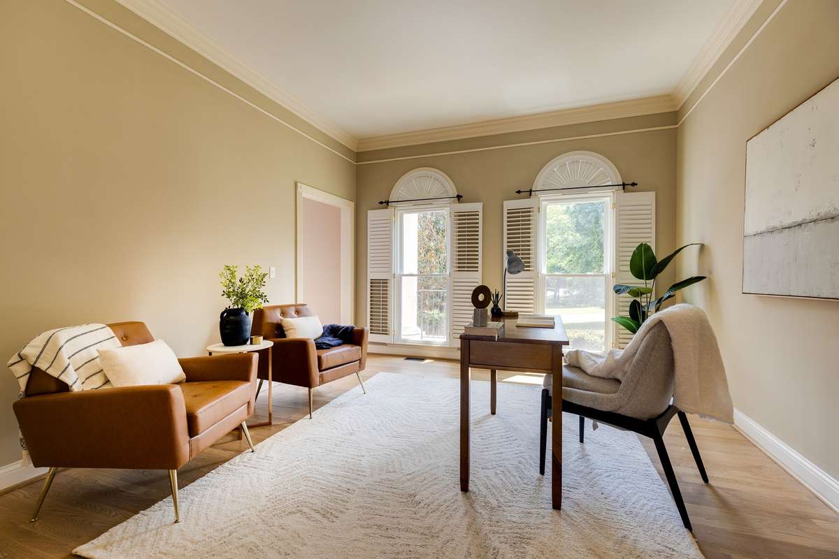 plantation shutters on windows in study
