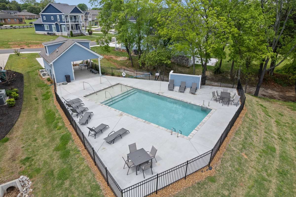 Community pool with covered area for picnics- also has bathroom facilities