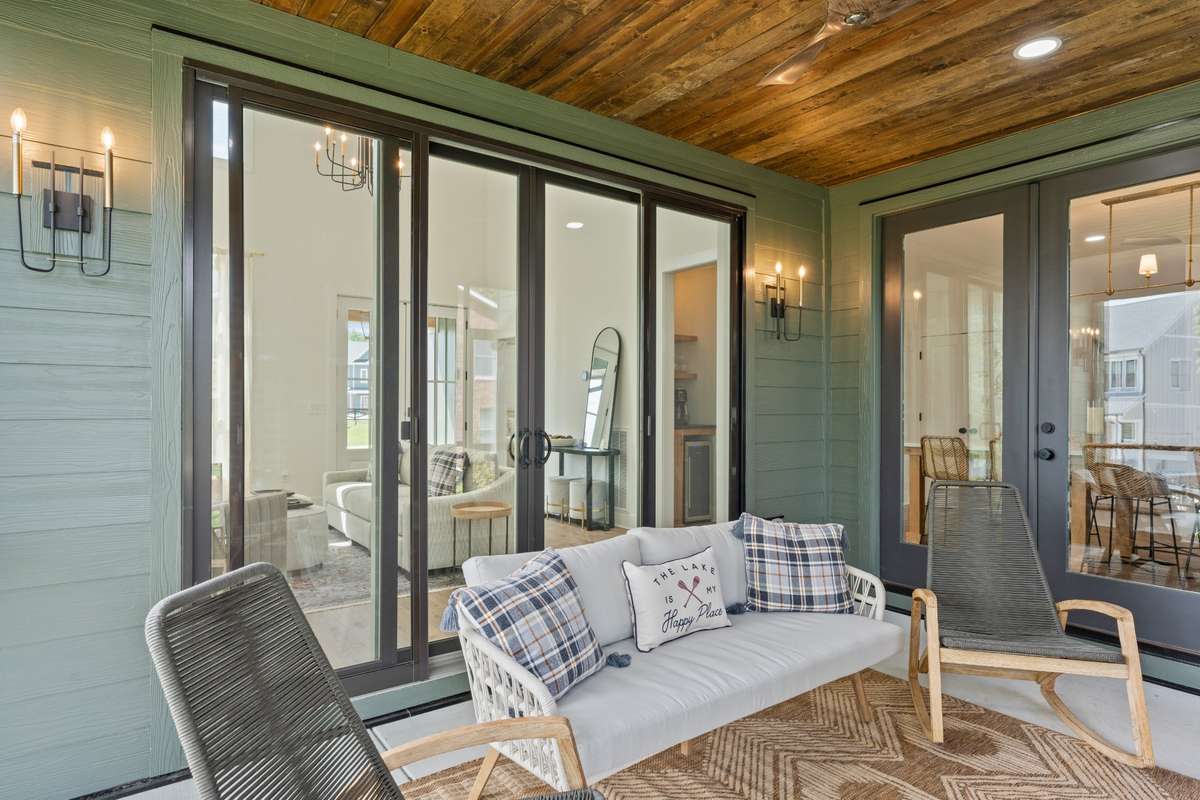 Screened in porch has door from the kitchen as well