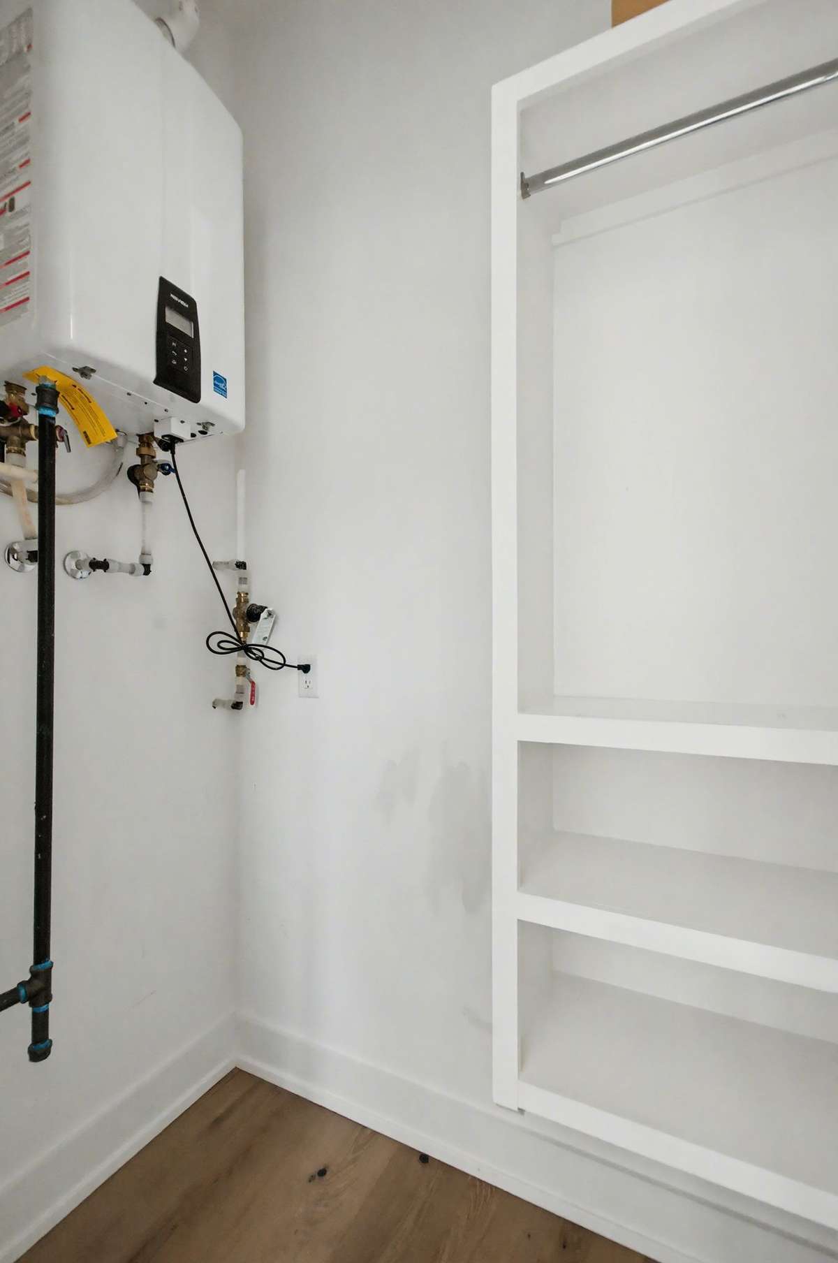 Second Bedroom Closet/Tankless Water Heater