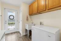 The mud room provides the perfect spot to kick off shoes and store outdoor gear, keeping the rest of the home clean and clutter-free.