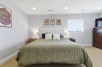 Enjoy comfort and privacy in this large master bedroom, perfectly situated upstairs for a quiet escape from the main living areas.