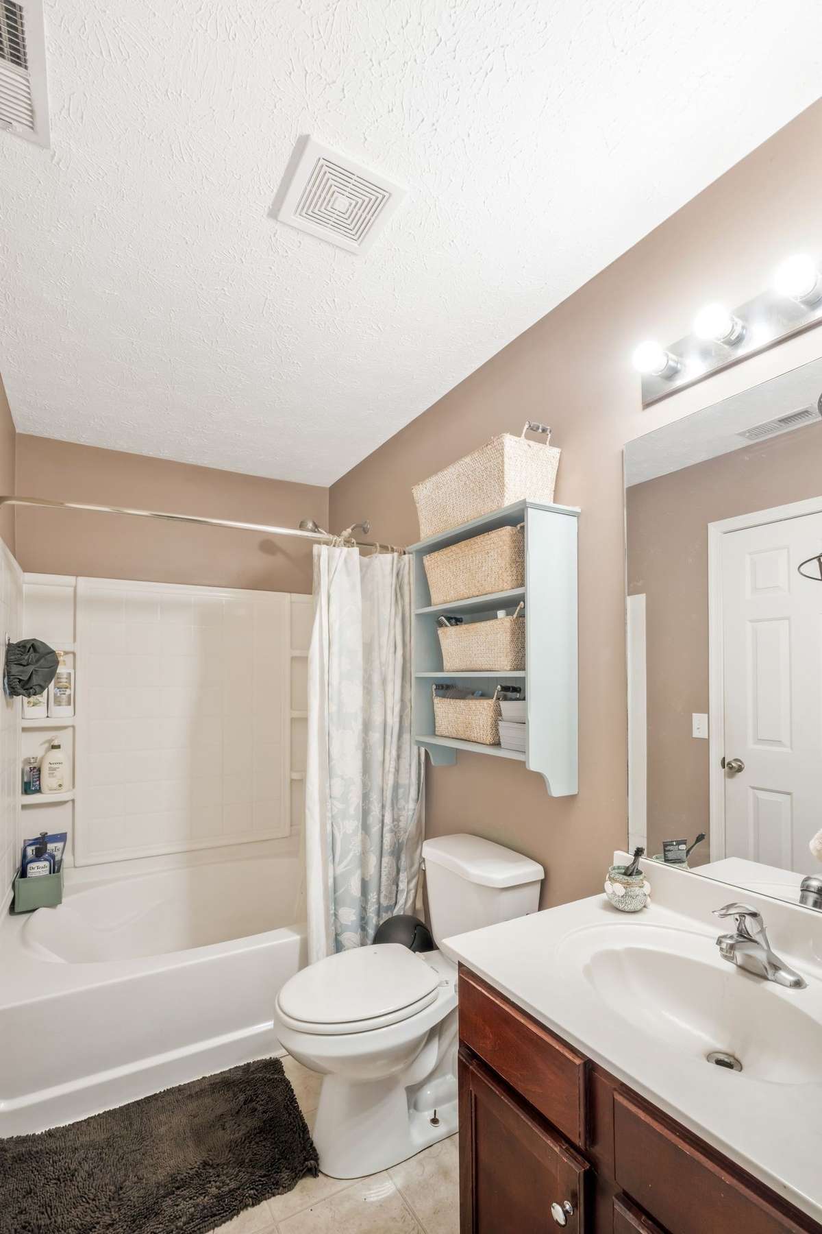 Primary suite has a garden tub...
