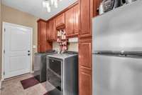 Spacious Laundry Room with Lots of Cabinetry!