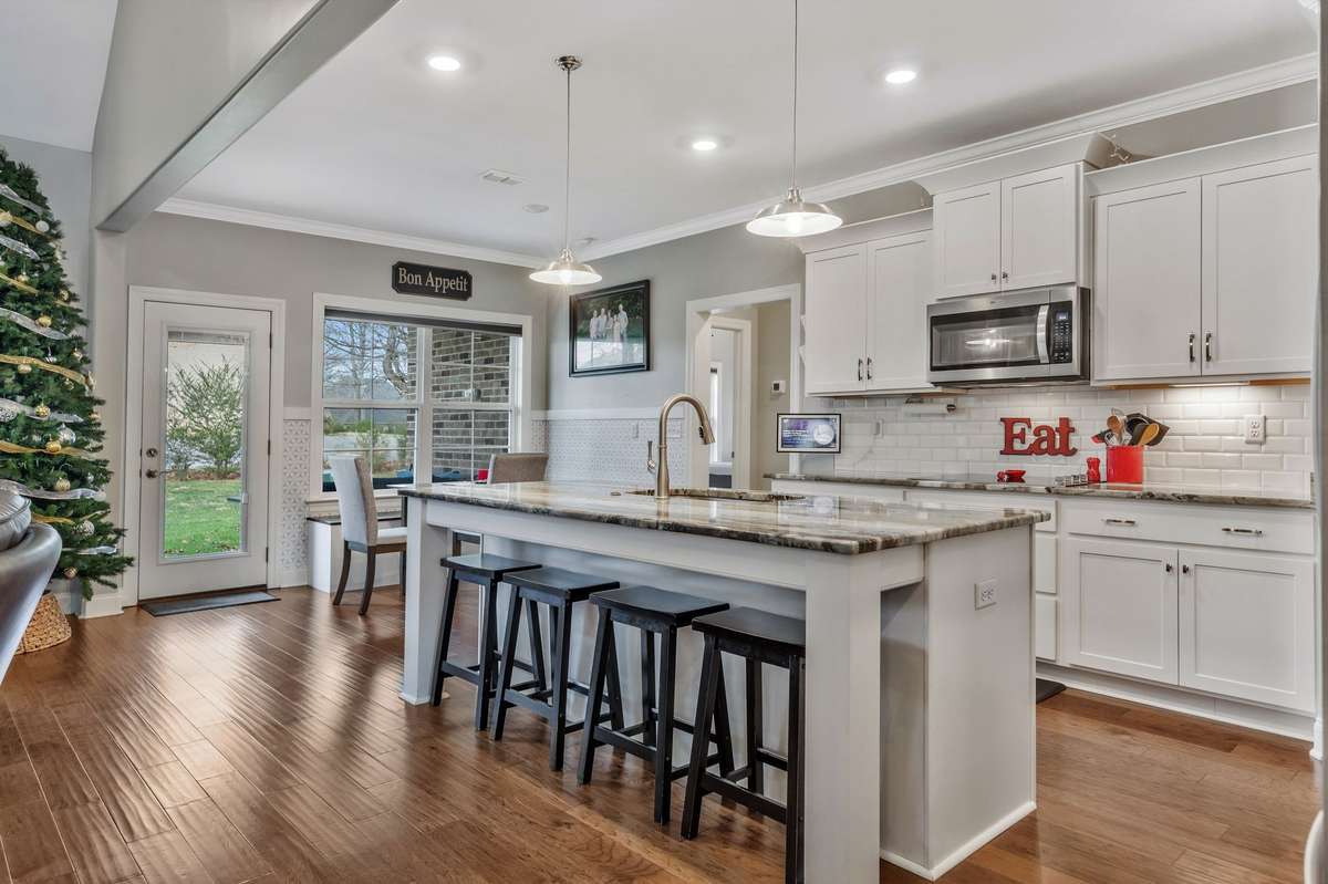 Large Island with plenty of seating. Beautiful hardwood floors.