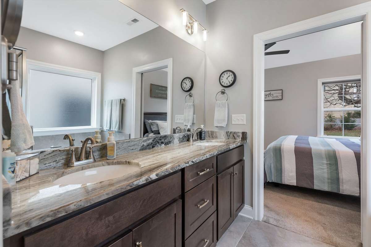 Granite and double sinks.  Plenty of light and storage.