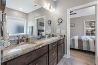 Granite and double sinks.  Plenty of light and storage.