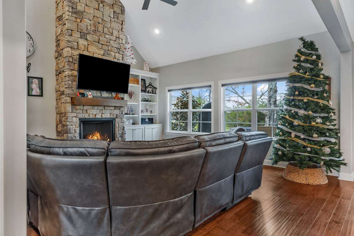 Spacious family room for gathering and entertaining.  Lots of Natural light.