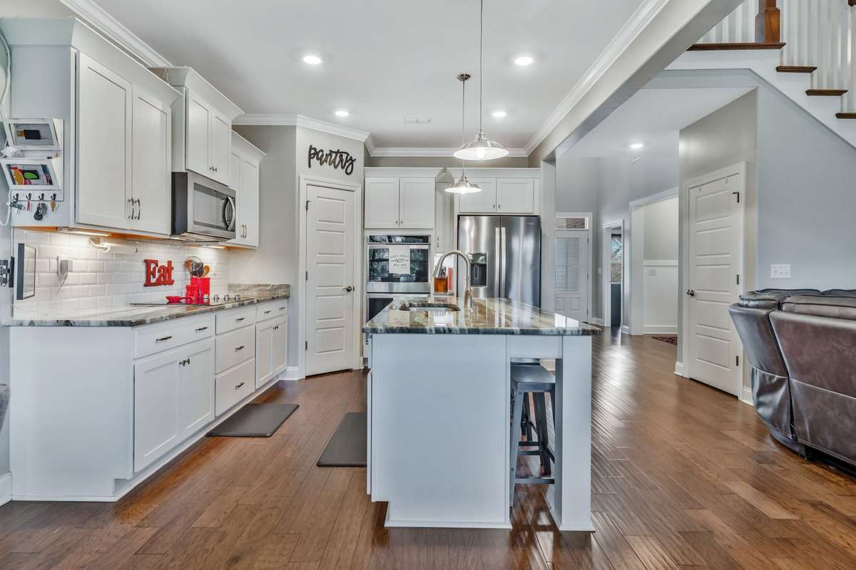 Corner pantry in Kitchen and extra pantry under the stairs for even more storage.