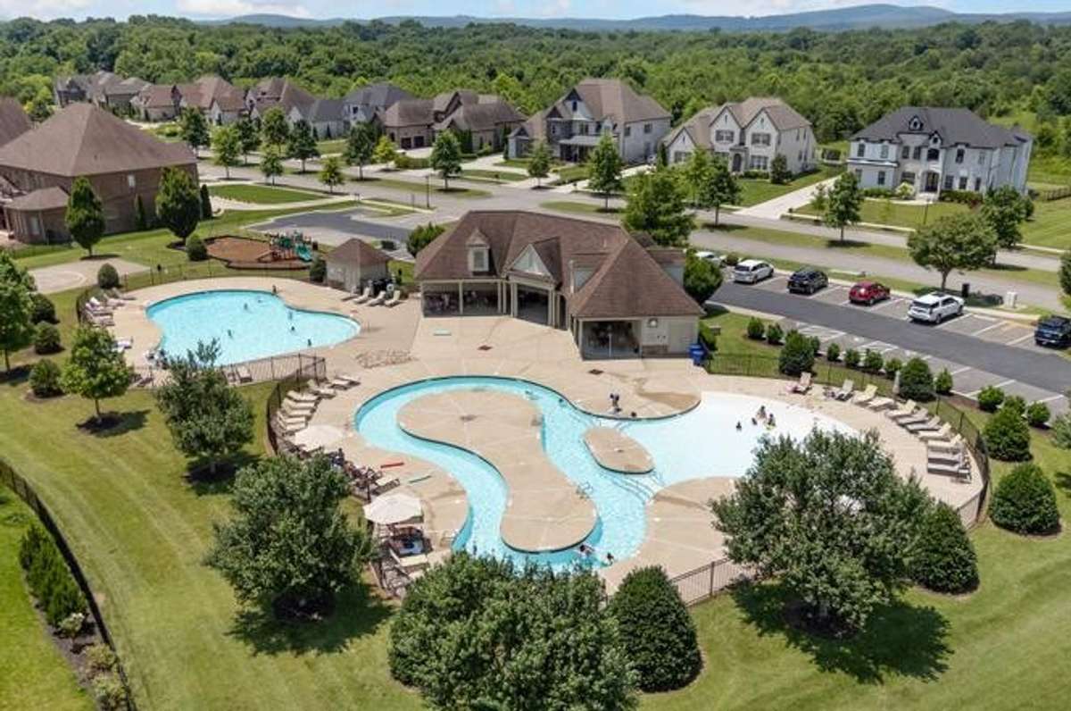 Community Amenities include sidewalks to pool, lazy river, playground and basketball court.