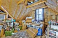 Attic space with window that could be converted to living space.