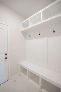 Mudroom off the Garage with a Built-in Hall Tree!
