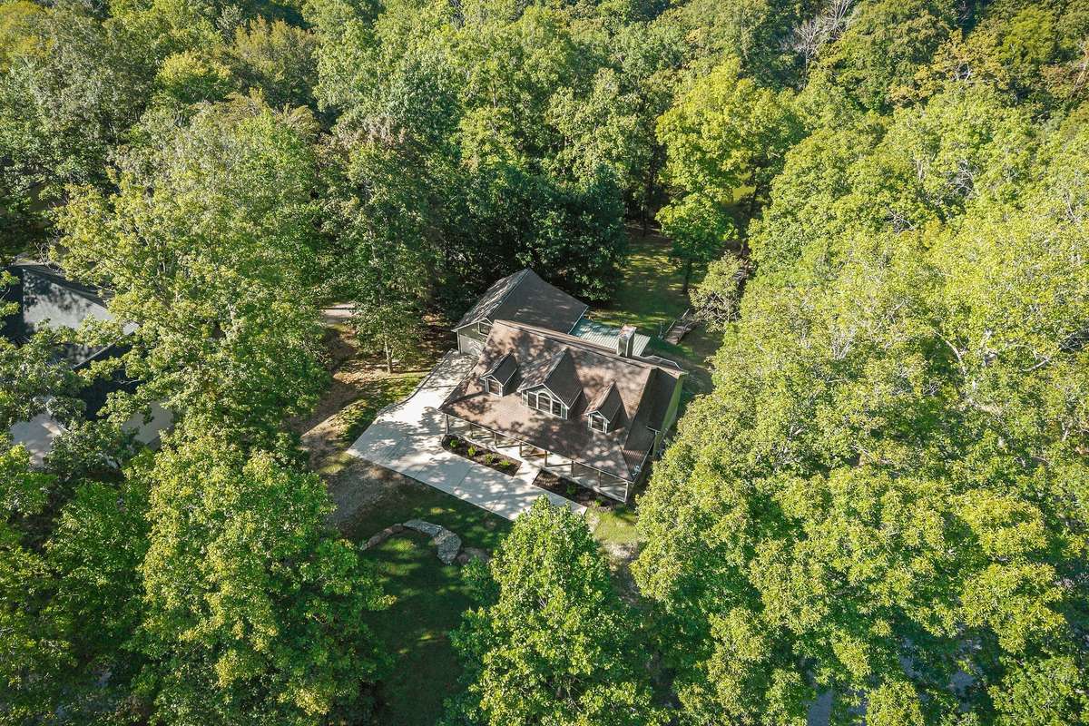 This fantastic view of the home shows how it is nestled amid the area's beauty.