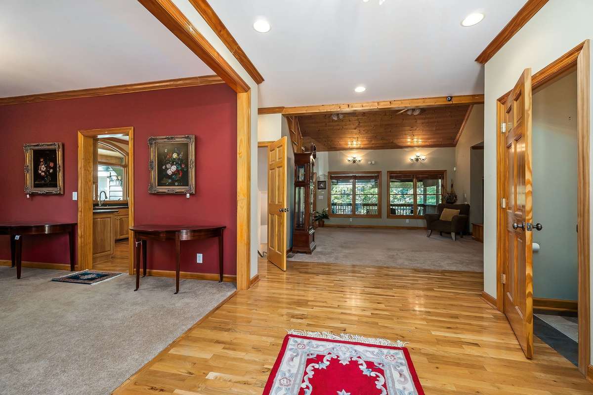 Upon entering the home, you are immediately drawn to the open concept living area.