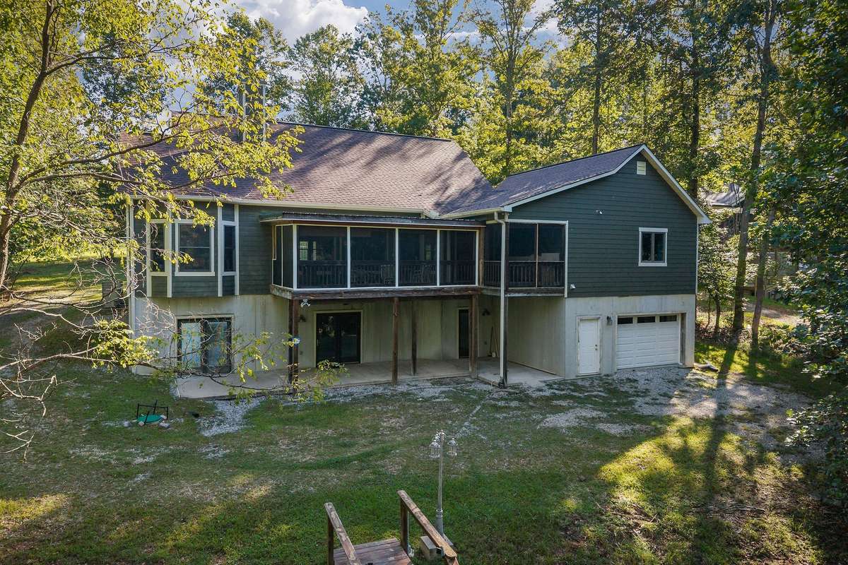 The rear view of the home offers plenty of shade for outdoor parties in the backyard.