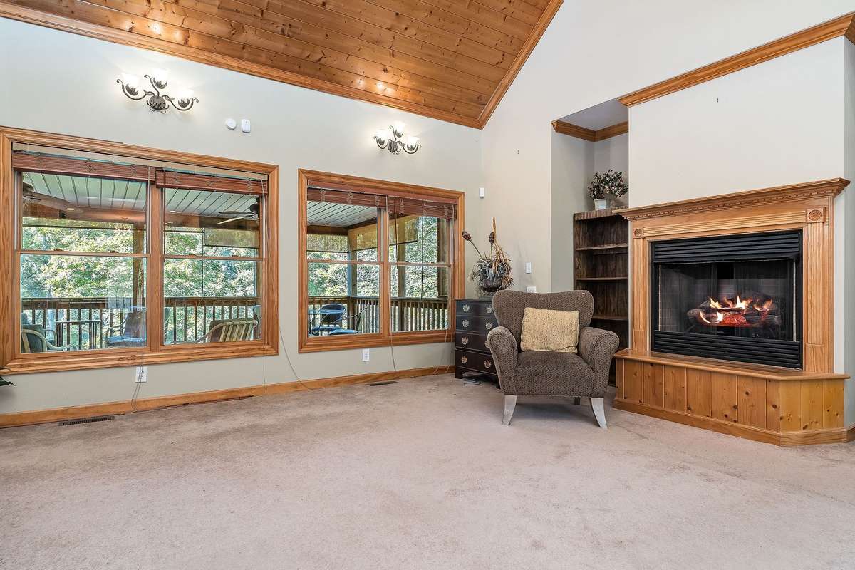 The large windows in the living room provide loads of natural light.