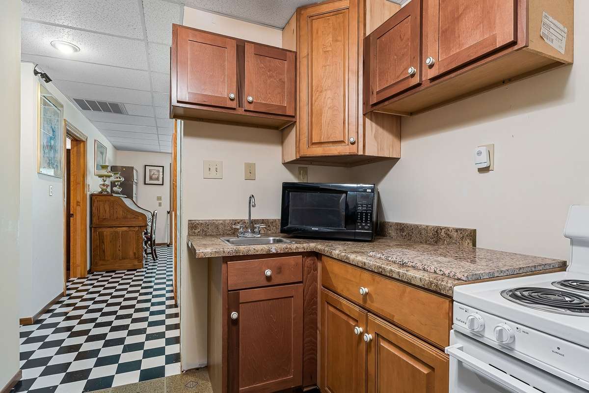 The downstairs kitchen also has storage.