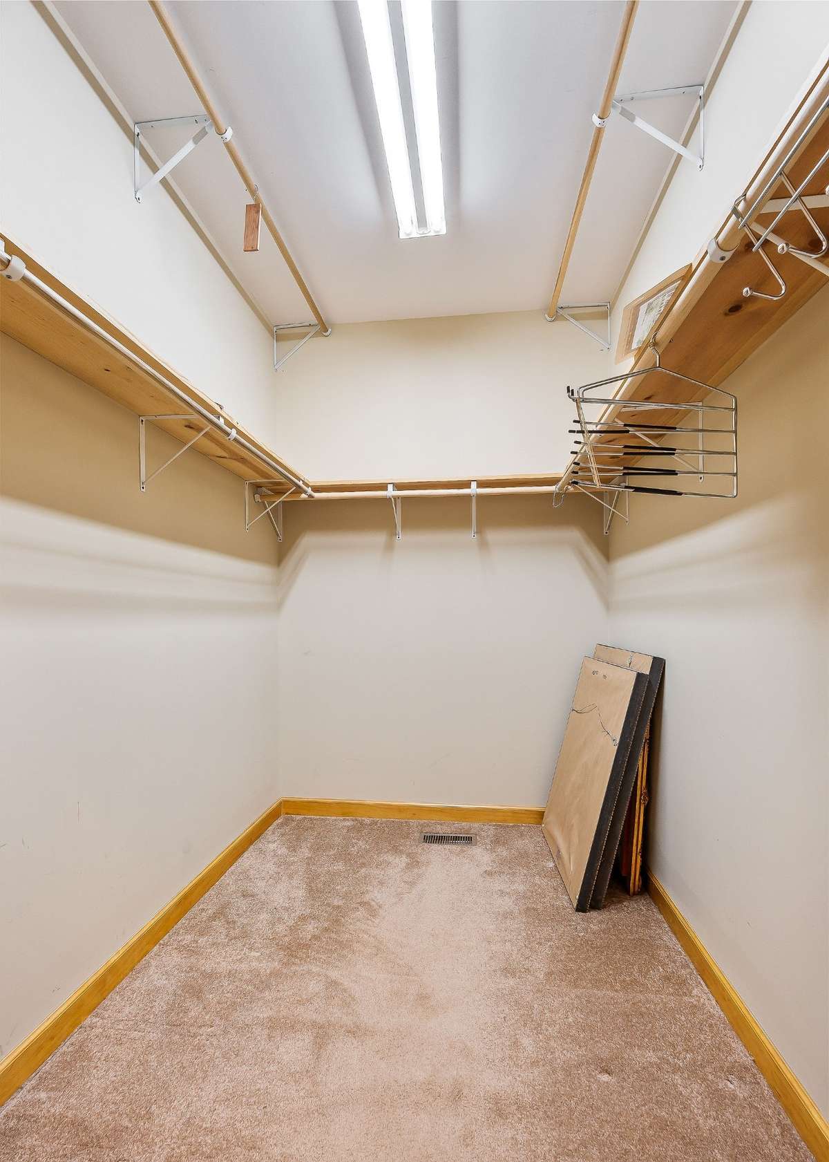 There is a large lighted walk-in close in the primary bedroom.