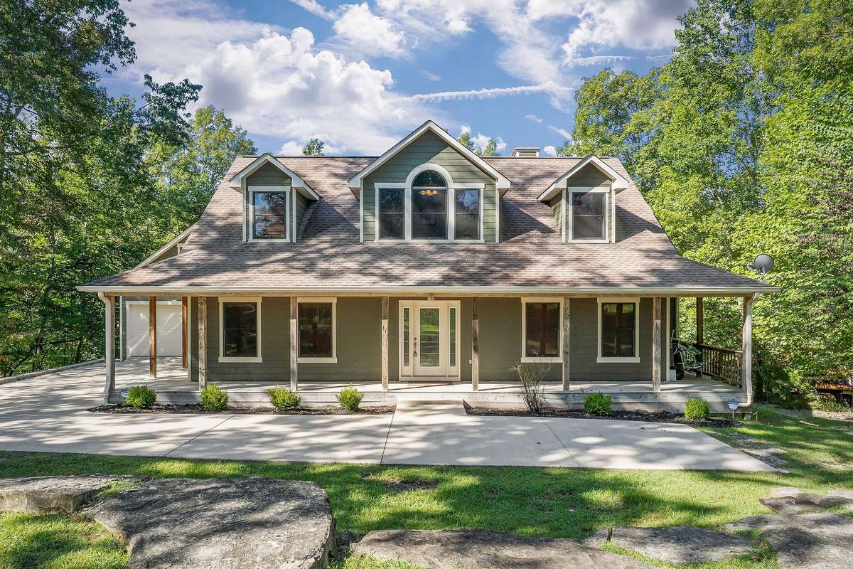 Bring the entire family and come home to 115 Long Point Drive, in beautiful Rock Island, TN