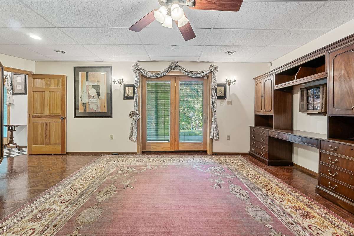 The furniture in the den will remain with the home.