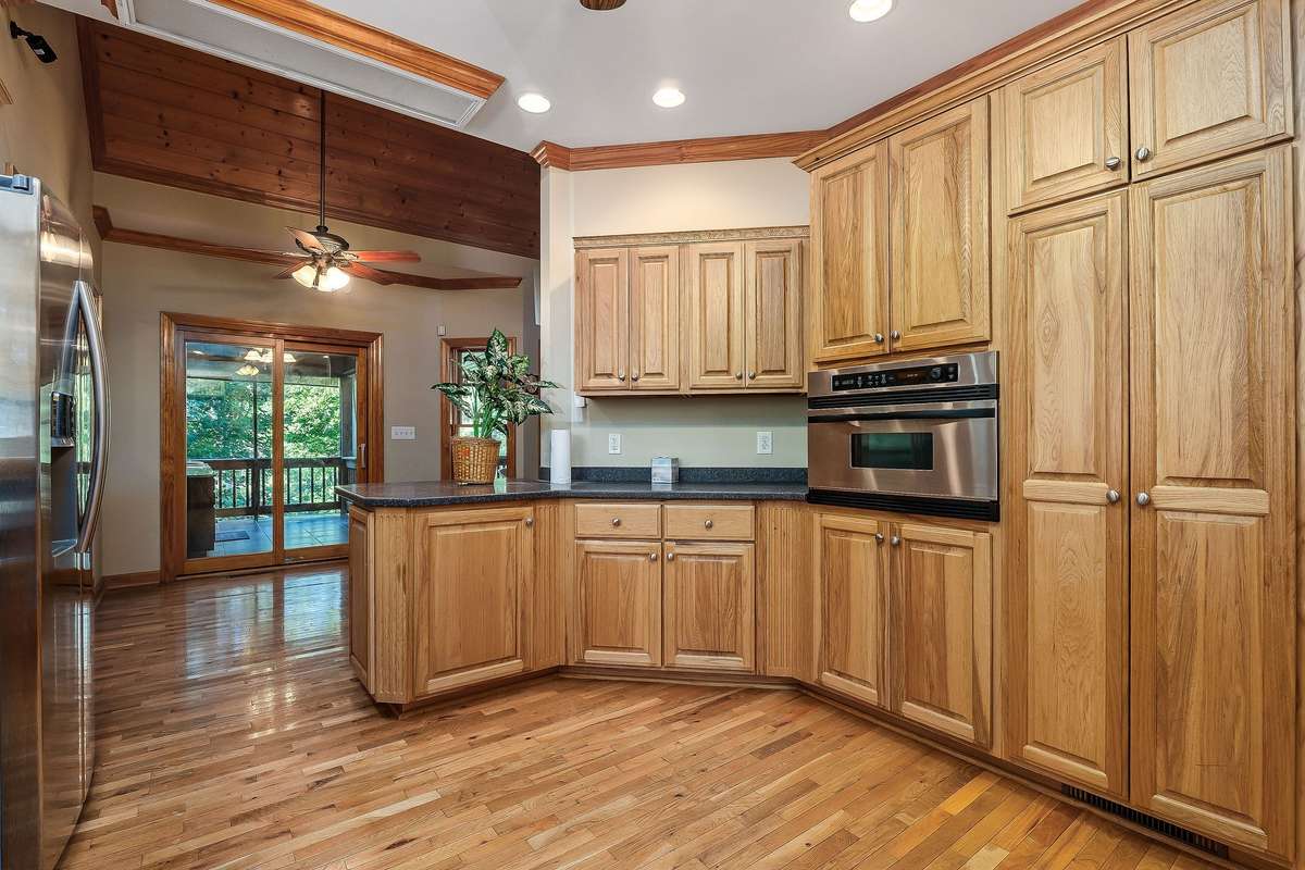 The kitchen has an abundance of storage.