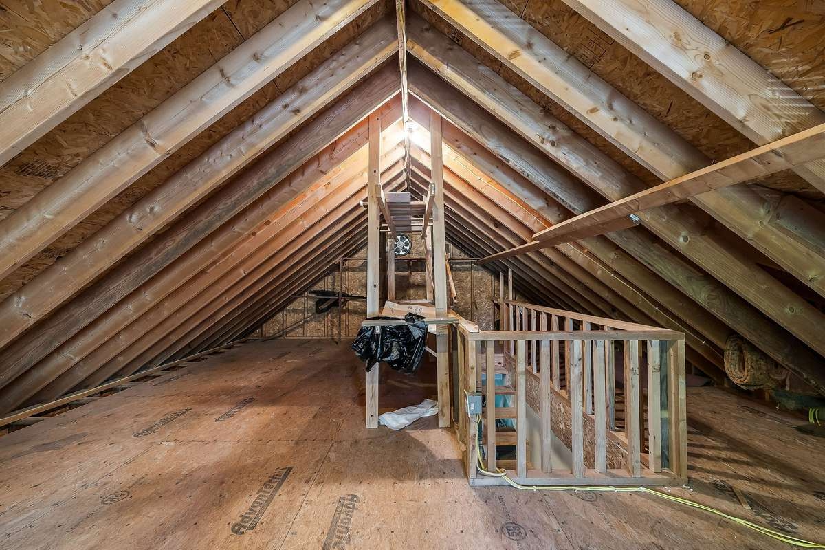 This large room is above the 1-car garage on the main level.  This will add additional storage to the home.
