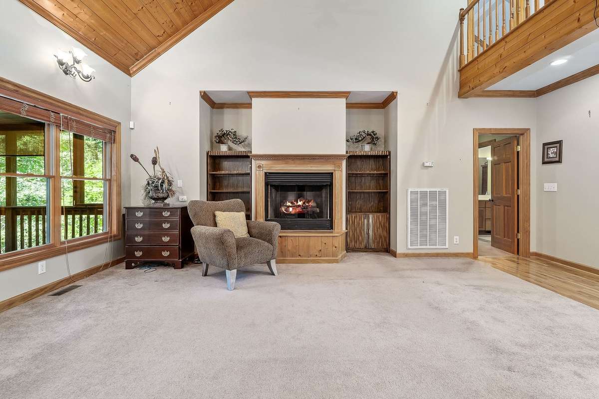 The living room features a gas fireplace for a cozy winter day.
