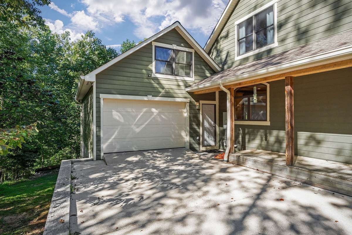 The garage on the main level leads directly into the pantry/laundry area, located off the kitchen.