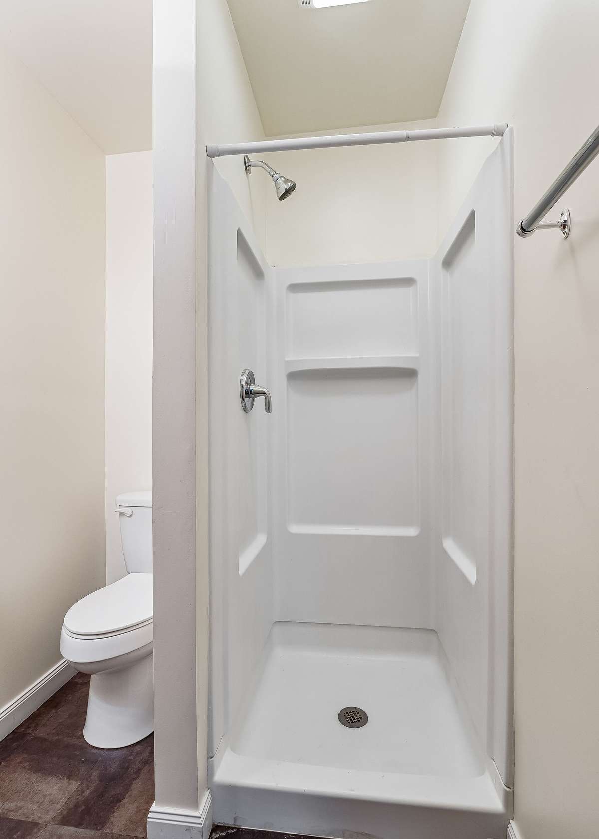 The downstairs bathroom has a walk-in shower.