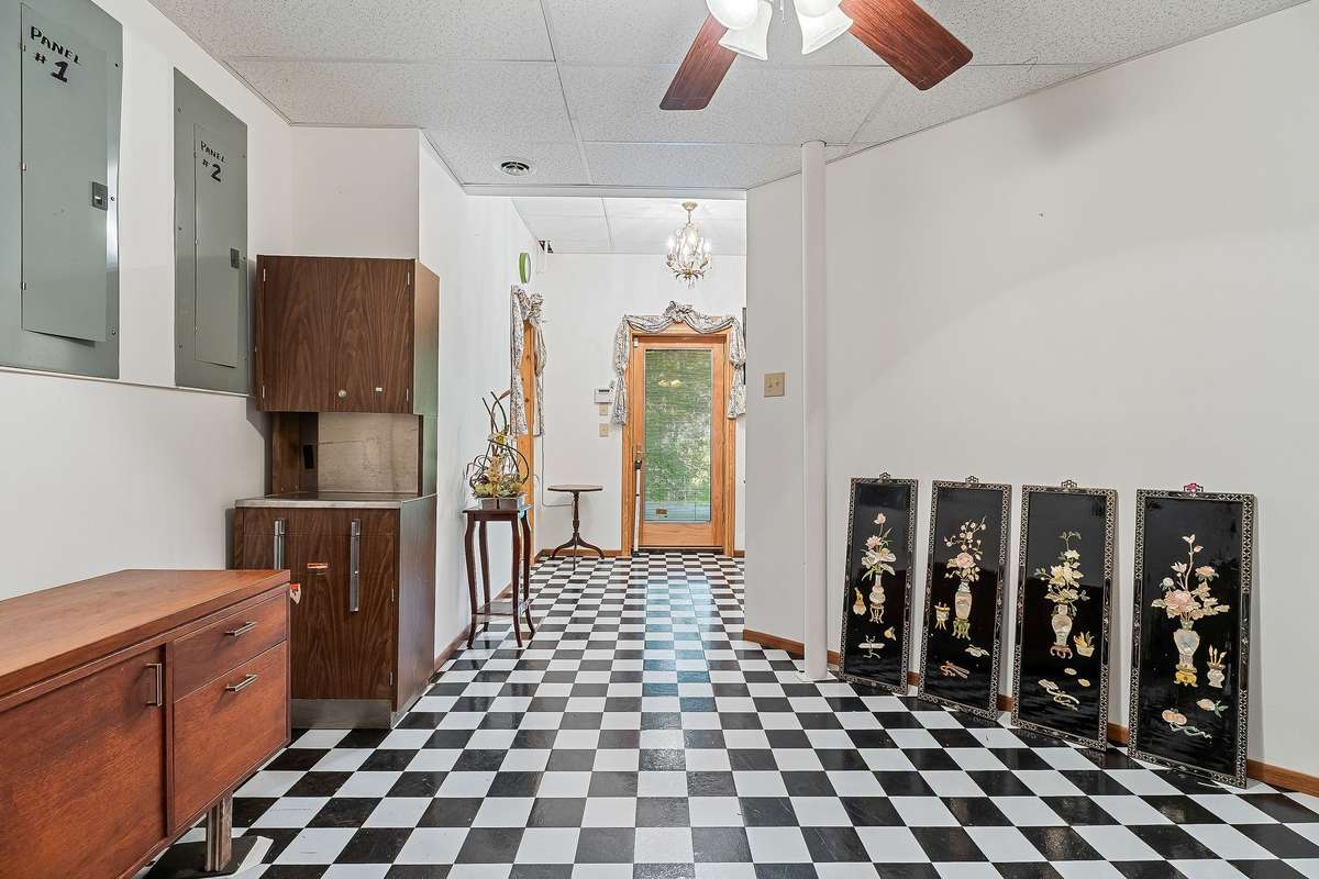 This view shows the door leading to the covered downstairs patio.
