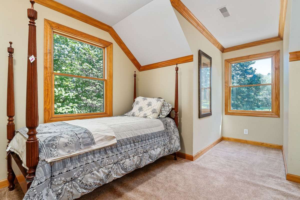 This room is setup as a bedroom.  It is one of the four rooms upstairs. This could be used as a playroom.