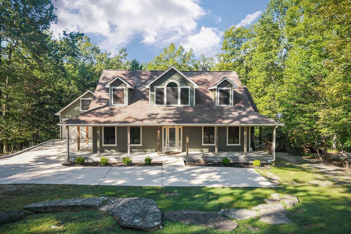 The concrete around the front of the porch and on the side provides extra parking space for get-togethers.