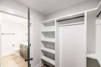 All closets have custom wooden shelving.