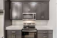 Beautiful upgraded custom cabinetry~