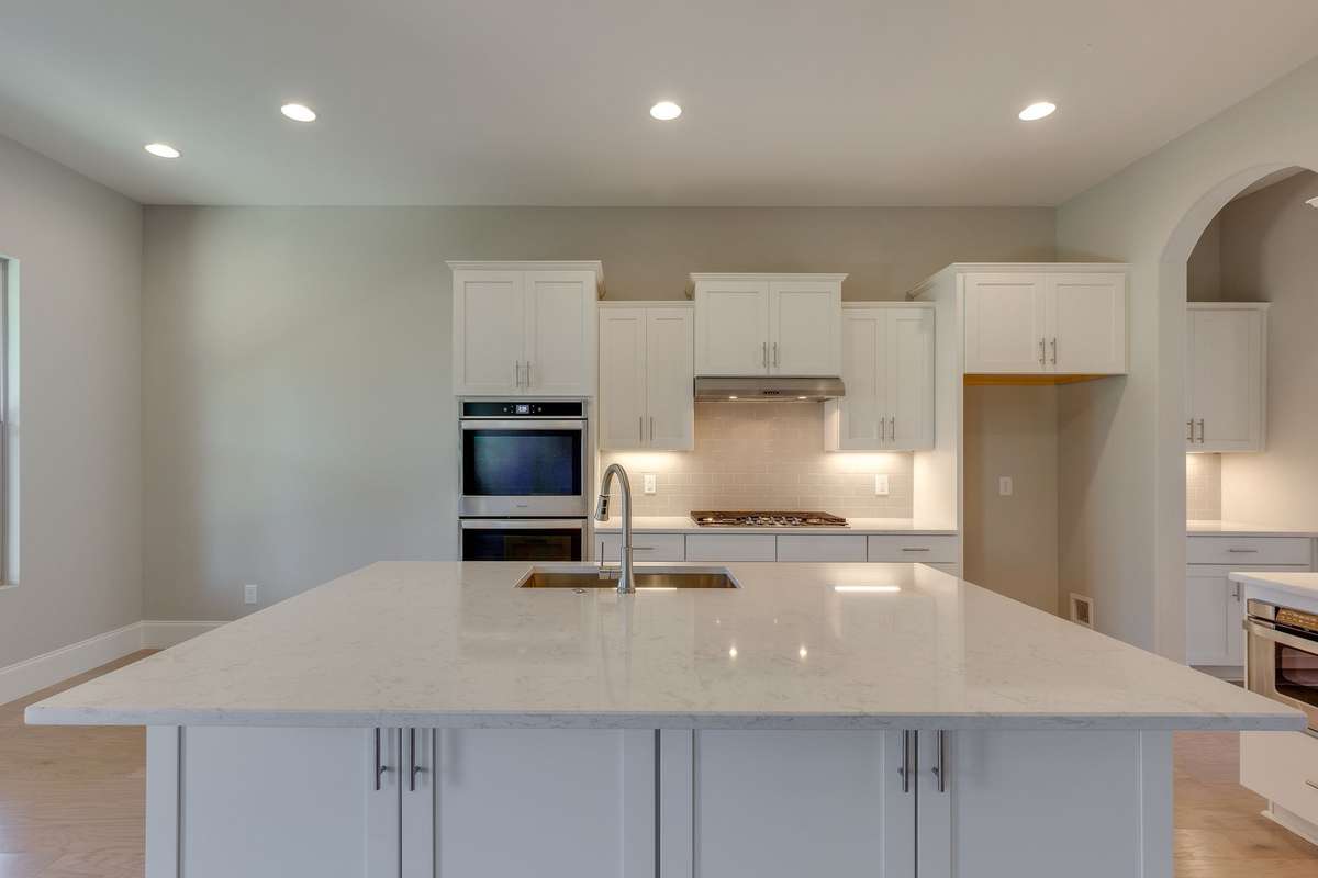 ** PHOTOS OF A SIMILAR HOME **