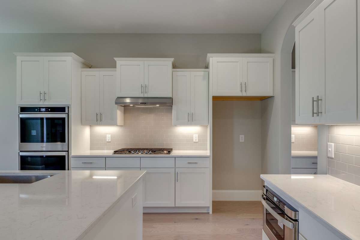 ** PHOTOS OF A SIMILAR HOME **