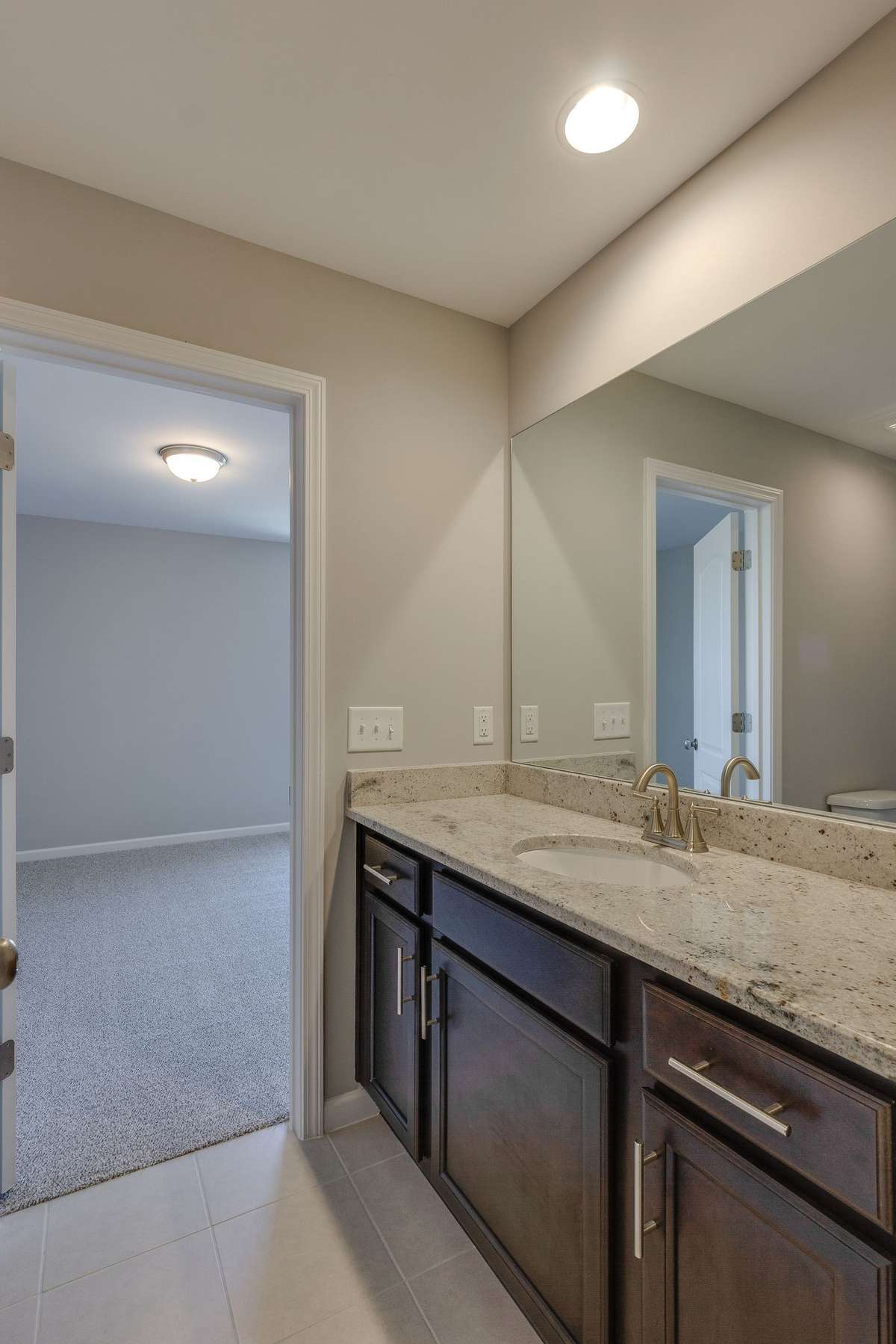 ** PHOTOS OF A SIMILAR HOME **