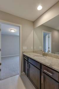 ** PHOTOS OF A SIMILAR HOME **