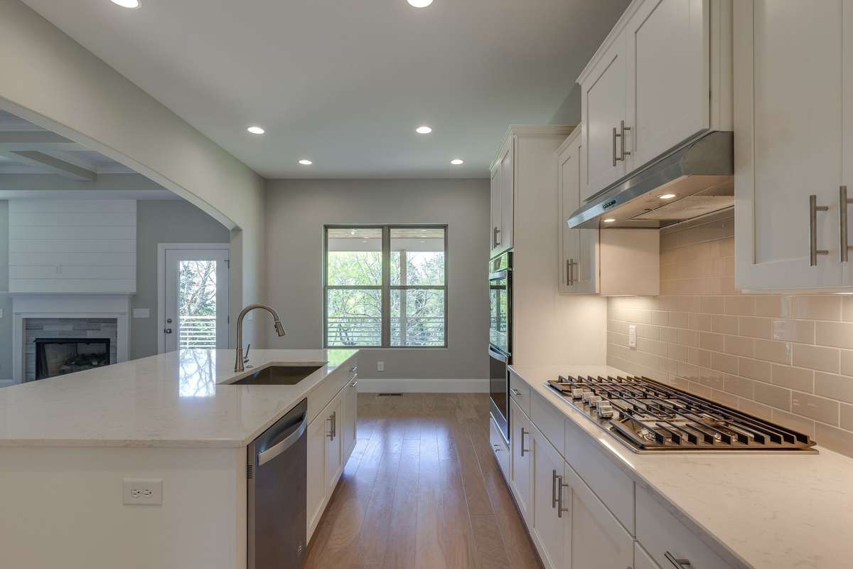 ** PHOTOS OF A SIMILAR HOME **