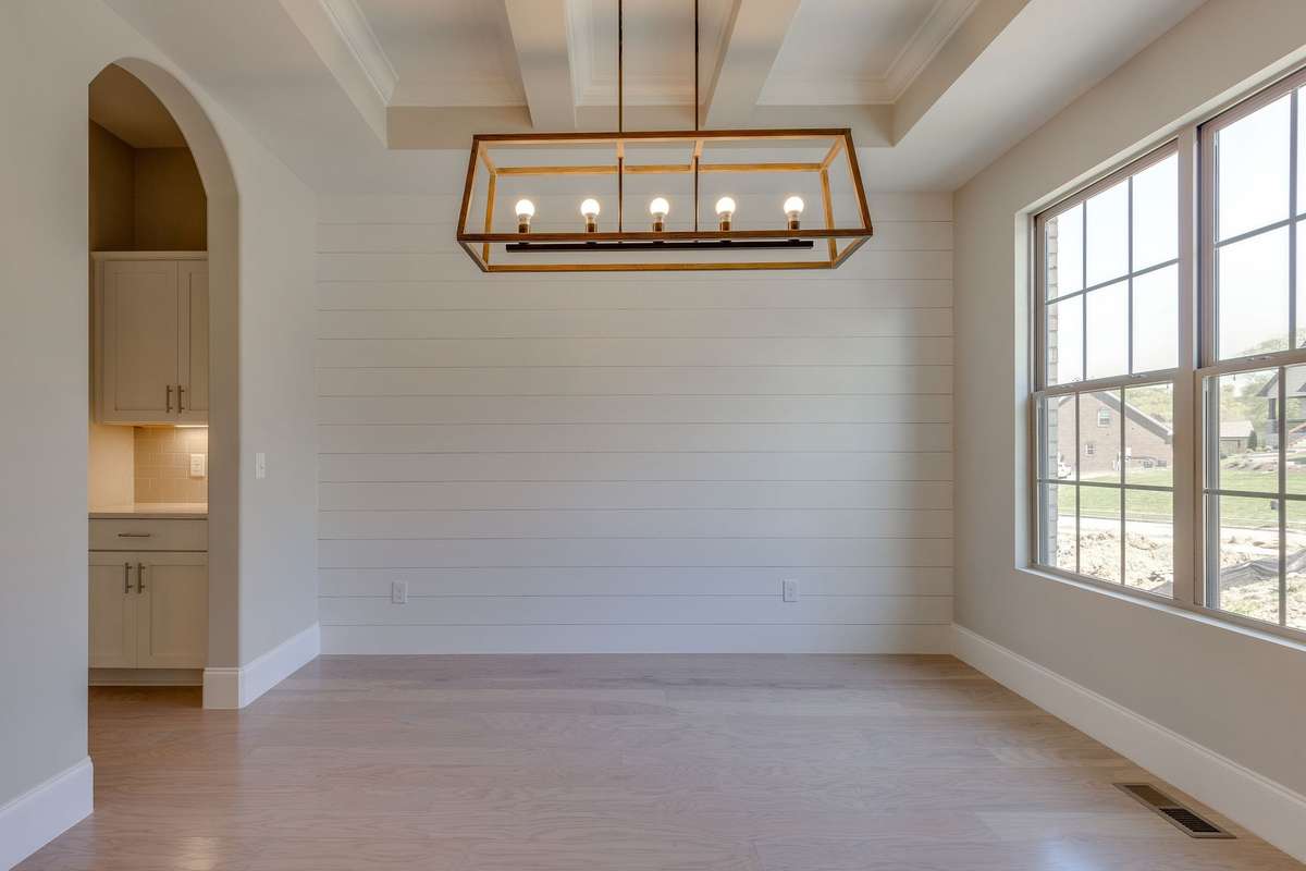 ** PHOTOS OF A SIMILAR HOME **