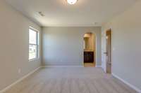 ** PHOTOS OF A SIMILAR HOME **